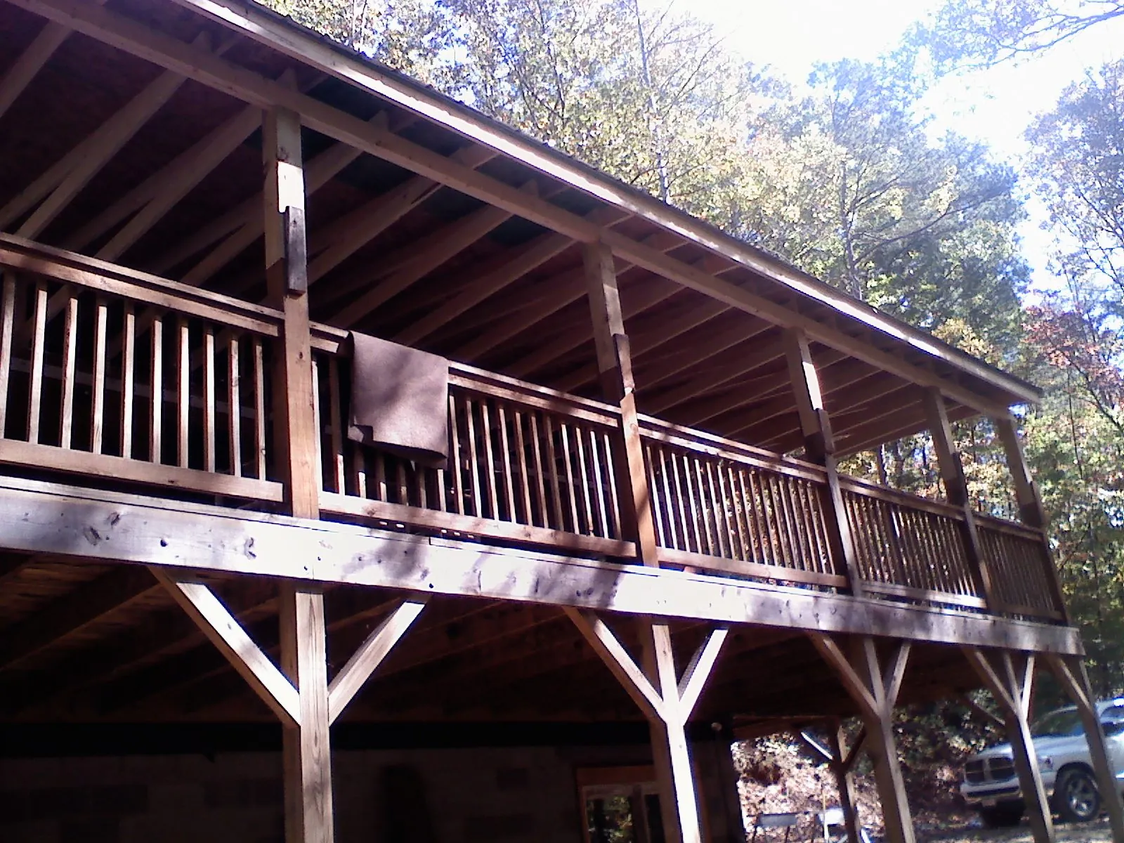 Timber framing under a new elevated porch and deck — Roof Leak Repair in Rush Center by Roofing Brothers